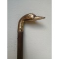 Solid brass duck head walking stick.