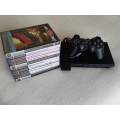 Playstation 2 Console + 7 Games (PS2 Slim)