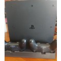 PlayStation 4 slim 500GB bundle with two controllers and six games , excellent condition