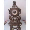 Ornate Brass Mantel  Clock with Cherubs.