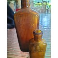 Pair of Amber Athrocopy  Poison Bottle