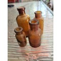 Group of Amber Athrocopy  Bottles