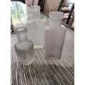 Group of  Frosted Vintage Anthropology Bottles