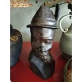 Wooden African Bust with a man with a Hat