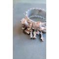 Hinged Silver Bracelet with Vintage Charms