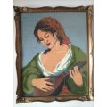 Framed Tapestry of Girl playing an Instrument.