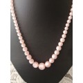 Vintage pearlized Pink necklace with matching earrings