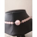 Vintage pearlized Pink necklace with matching earrings