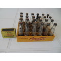 24 glass Pepsi Cola bottles with Coca Cola  grate size of grate is 150mm