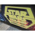 Large Star Wars plastic & metal sign off a arcade machine 1070mm wide weighs 18kg collection only