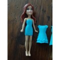Small Doll with removable plastic dresses