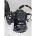 Canon Power Shot SX50 HS with extra battery and bag