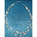 Floating Pearl necklace with sterling silver clasp