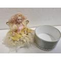 Small container with Porcelain doll top