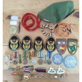 Large collection of military medals, badges and clothing. Please read.