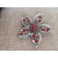Chrome Plated Flower with Red Glass stones Broach