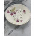 Antique serving bowl with holes