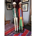 PAIR OF WOODEN COLONIAL FIGURINES