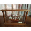 sailing ship in glass case