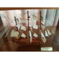 sailing ship in glass case
