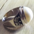 `NWJ` JEWELERS STERLING SILVER RING, WITH MABE PEARL.