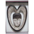 Box framed 3D African head carved from stone
