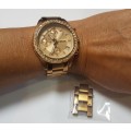 Ladies Rose Gold and diamante Fossil chronograph watch c/w additional links
