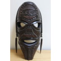 Central African carved wooden mask - There is a slight scuff mark on the head/top