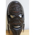 Central African carved wooden mask - There is a slight scuff mark on the head/top