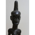 Central African carved wooden figure of a mother holding her baby