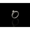 9ct, 3.2gr White Gold,0.27ct Round Brillant Diamond K SI1 with smalls on the band