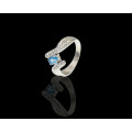 9kt, (4.5grams) White Gold, Blue Topaz and Diamond Ring