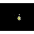 9ct (1.1 grams) White gold Peridot and diamond pendant