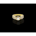 18ct (5.6grams) Yellow Gold 0.54ct Round Brilliant Diamond L SI1 Ring with smalls c/w GIA cert