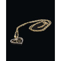 3.6 grams   Total Weight 9 carat Yellow Gold Chain and Cubic Zirconia Heart Pendant