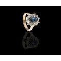 3.8 grams 14 carat Yellow Gold Sapphire and Diamond Halo Ring
