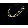 47.9 grams (total weight) 14 carat Yellow Gold Pearl and Precious Stone Double Row Necklace