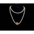 Single Strand Cultured Pearl Necklace with a 5.5 gram 18 carat Yellow Gold Clasp with Sapphires