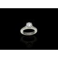 10.98 grams Platinum ORO Design Fancy Solitaire and Diamond Encrusted Ring