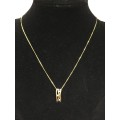3.1 grams 9 carat Yellow Gold Chain with a Two Tone and Diamond Pendant