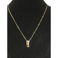 3.1 grams 9 carat Yellow Gold Chain with a Two Tone and Diamond Pendant