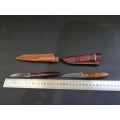 Two hand forged knifes with leather cases bid for both!!!!