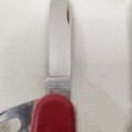 Collection of Victorinox Switzerland pocket knives and Richard`s SHEFFIELD knife bid for all!!!!