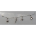 Silver charm bracelet ,turtle, sea horse, starfish,  & nautilus shell charms 800 mm / 31 ins length