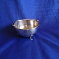 Silver plated bowl with 3 shell legs and handle