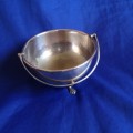 Silver plated bowl with 3 shell legs and handle