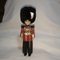 British Queen`s Guard Soldier.Doll Eyes Open & Close. Removable Sword. 9 inches height