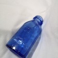Vintage cobalt blue Philips milk of magnesia bottle. Chemist Bottle