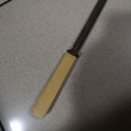 Vintage steel and bone handle utensil or reamer