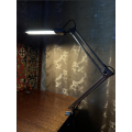 Industrial desk lamp with desk mount. May & Christie GMBH